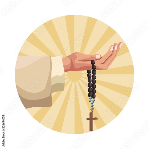 Hand holding rosary