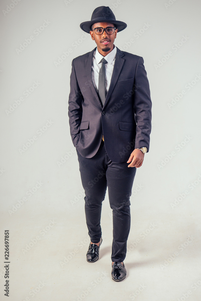 Retro style well dressed African american business man model in