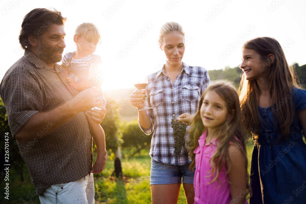 Wine grower family in vineyard Wine grower family in vineyard