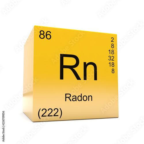 Radon chemical element symbol from the periodic table displayed on glossy yellow cube © concept w