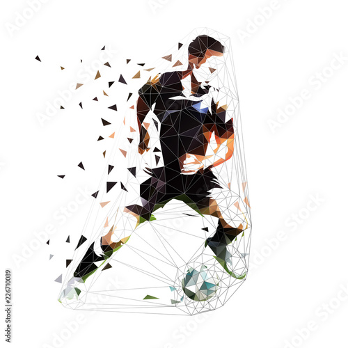 Football player in black jersey running with ball, abstract low poly vector drawing. Soccer player kicking ball. Isolated geometric colorful illustration, front view