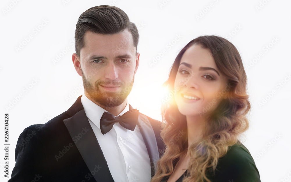 Portrait of a handsome man looking at the camera with a woman Portrait of a handsome man looking at the camera with a woman