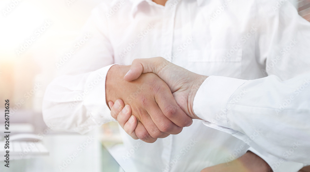 close-up handshake of business colleagues. close-up handshake of business colleagues.