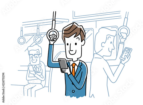 電車内でスマートフォンを使う男性
