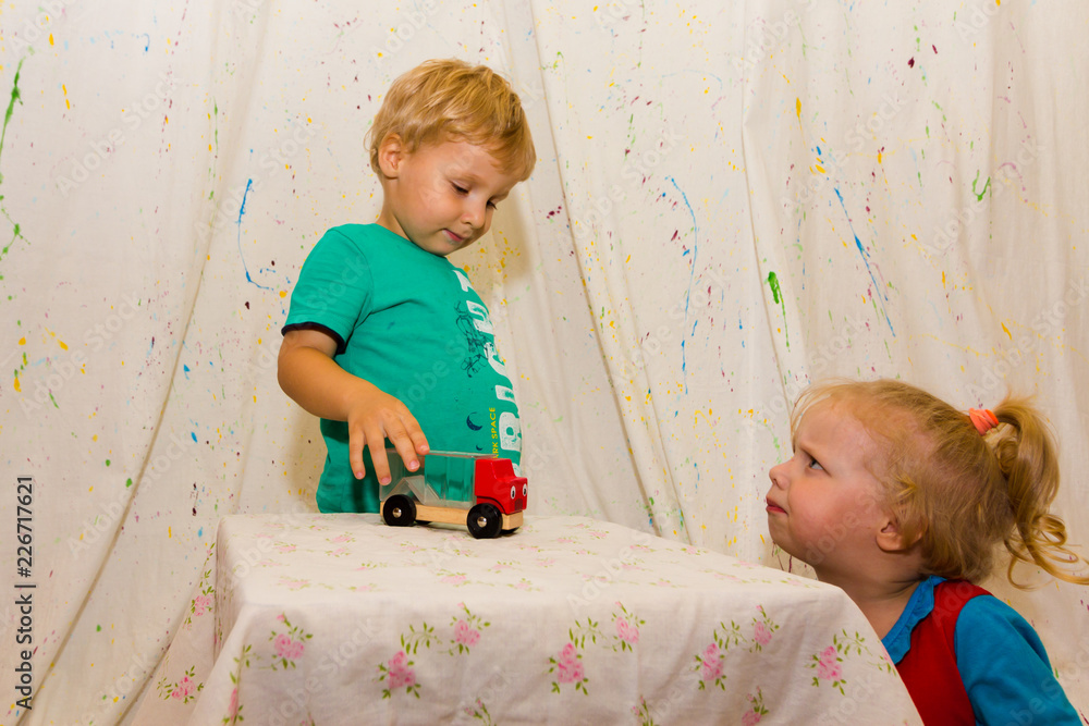 Fototapeta premium small children play educational game