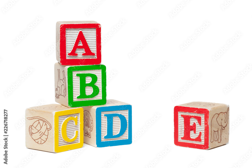 Wooden alphabet blocks isolated on white background Wooden alphabet blocks isolated on white background