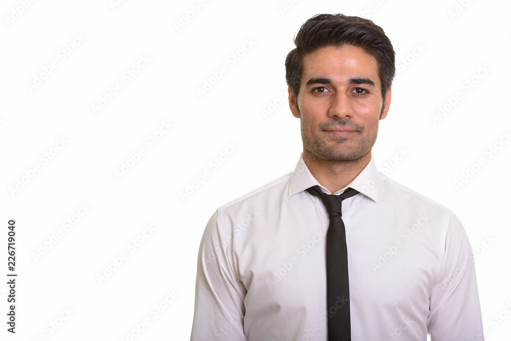 Young handsome Persian man against white background Young handsome Persian man against white background