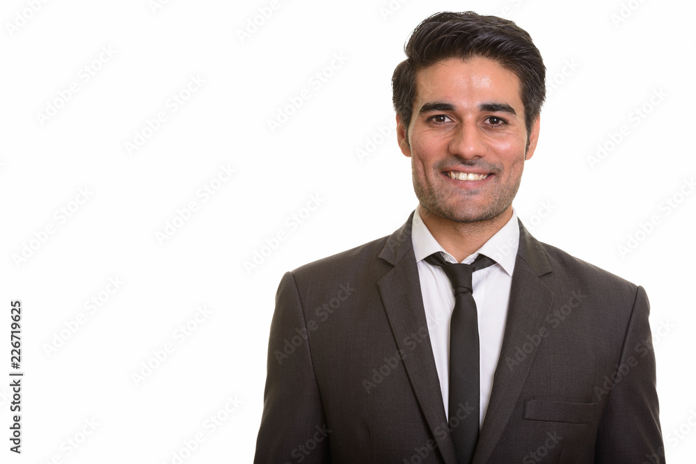 Young handsome Persian man against white background Young handsome Persian man against white background