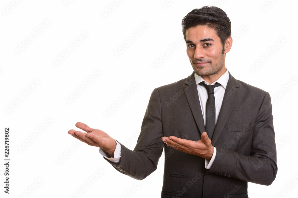 Young handsome Persian man against white background Young handsome Persian man against white background