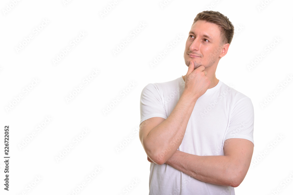 Handsome Caucasian man isolated against white background Handsome Caucasian man isolated against white background