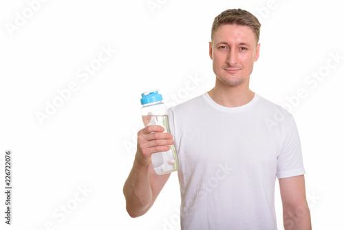 Handsome Caucasian man isolated against white background