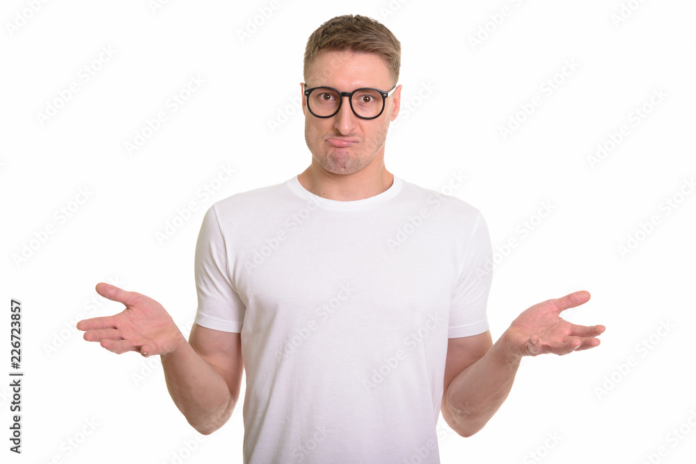 Handsome Caucasian man isolated against white background Handsome Caucasian man isolated against white background