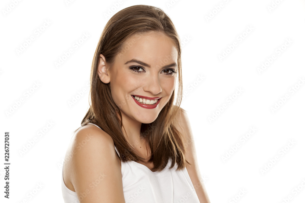 Portrait of young beautiful woman with makeup on white backgeound Portrait of young beautiful woman with makeup on white backgeound
