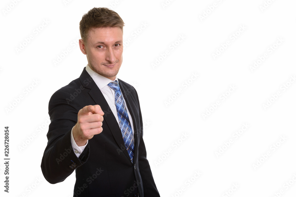 Handsome Caucasian man isolated against white background Handsome Caucasian man isolated against white background