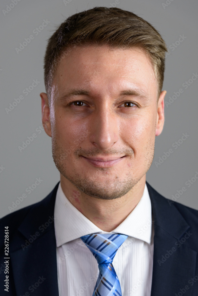 Handsome Caucasian man isolated against white background Handsome Caucasian man isolated against white background