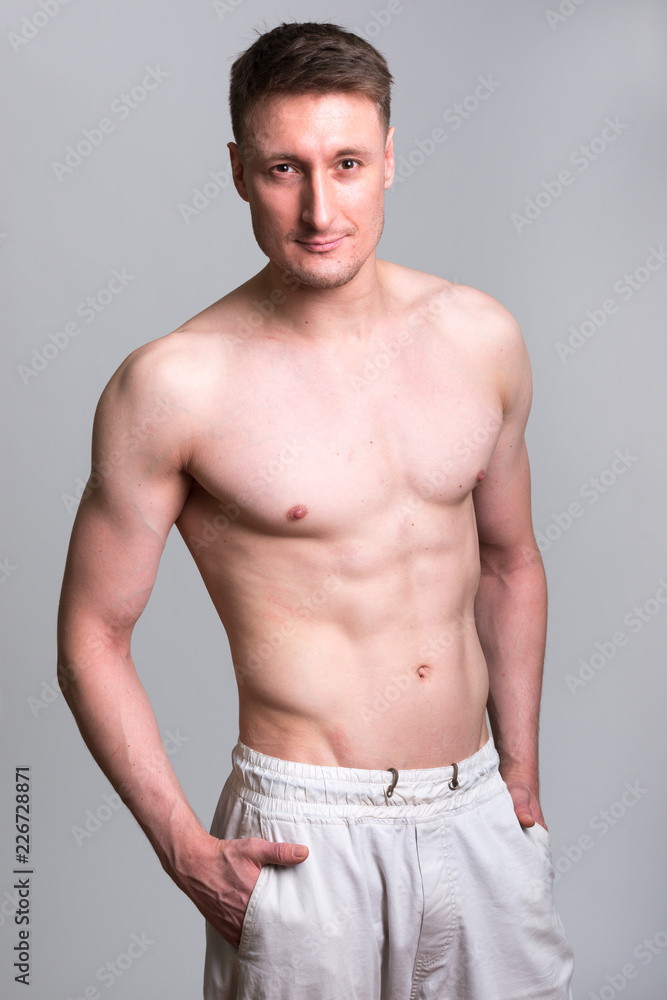 Handsome Caucasian man isolated against white background