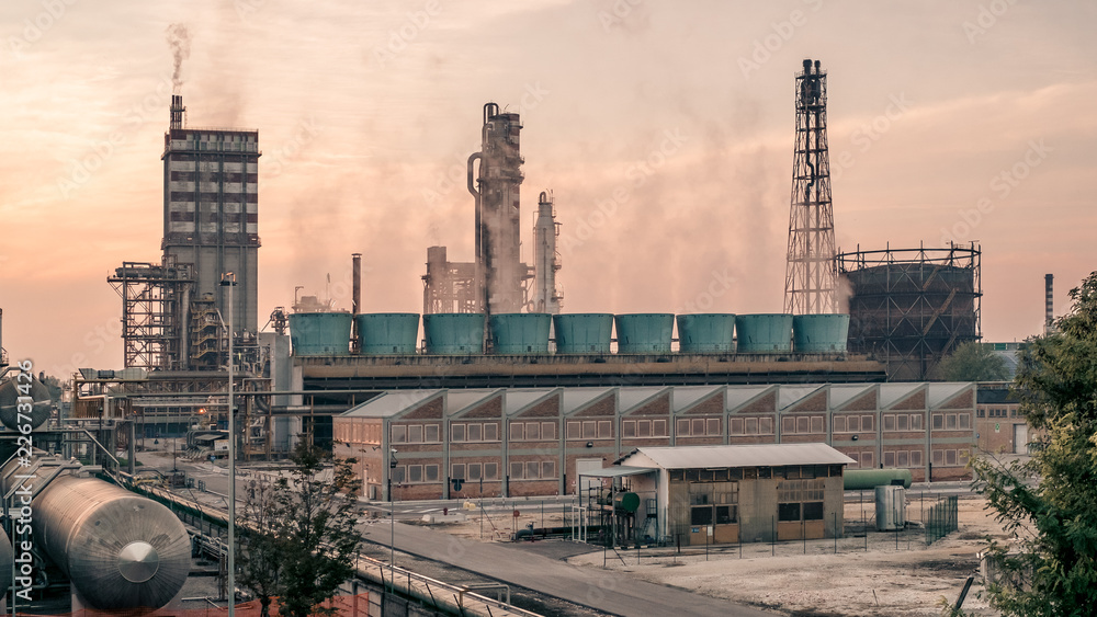 Industrial plant at sunset in Ferrara, Emilia Romagna, Italy.