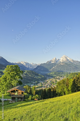 Mountain landscape in the Bavarian Alps with village of Berchtesgaden and Watzmann in the background Berchtesgadener Land  Bavaria  Germany