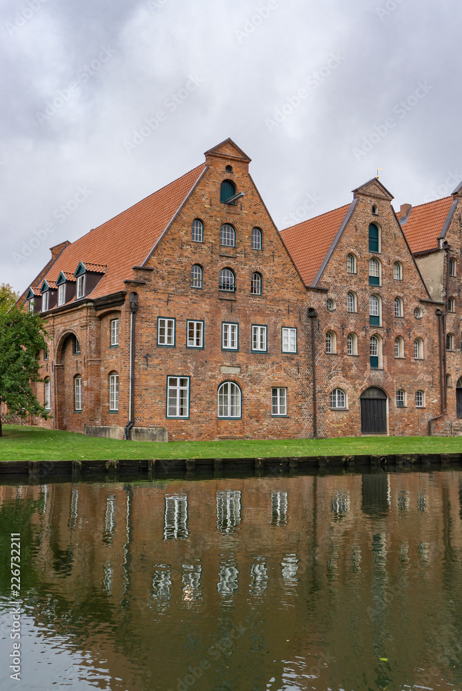 Naklejka premium Group of historic salt warehouses in Lübeck, Germany