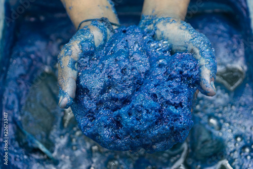 Process dye fabric indigo color in Phare Thailand. photo