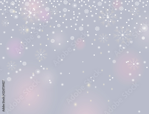 Falling snow border on a light silver grey background. Abstract winter lights blurry background for your Merry Christmas and Happy New Year design. Vector holiday illustration. Place for your text