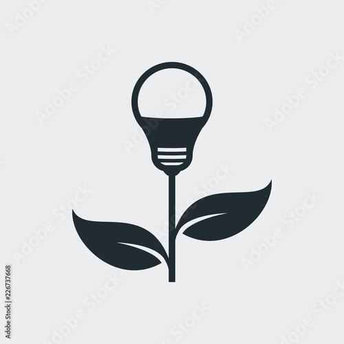 Logotipo bombilla led como planta en fondo gris