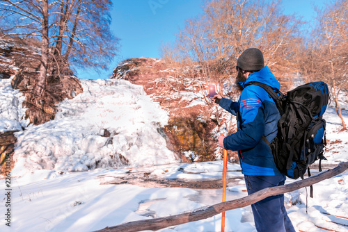 Man enjoying the winter landscape photo