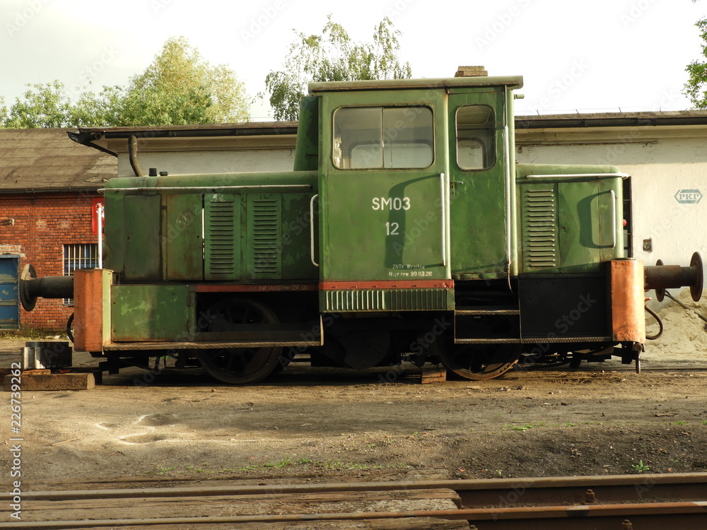the locomotive, a monument, a train, a metal, green the locomotive, a monument, a train, a metal, green