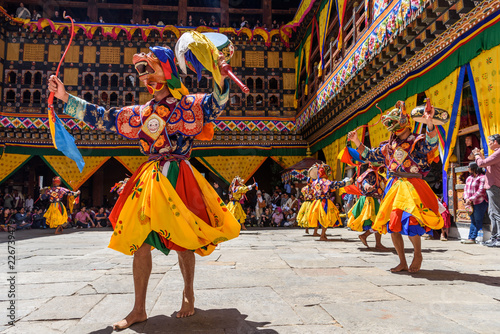 Bhutan Monk dancing for colorful mask dance at yearly Paro Tsechu festival in Bhutan photo