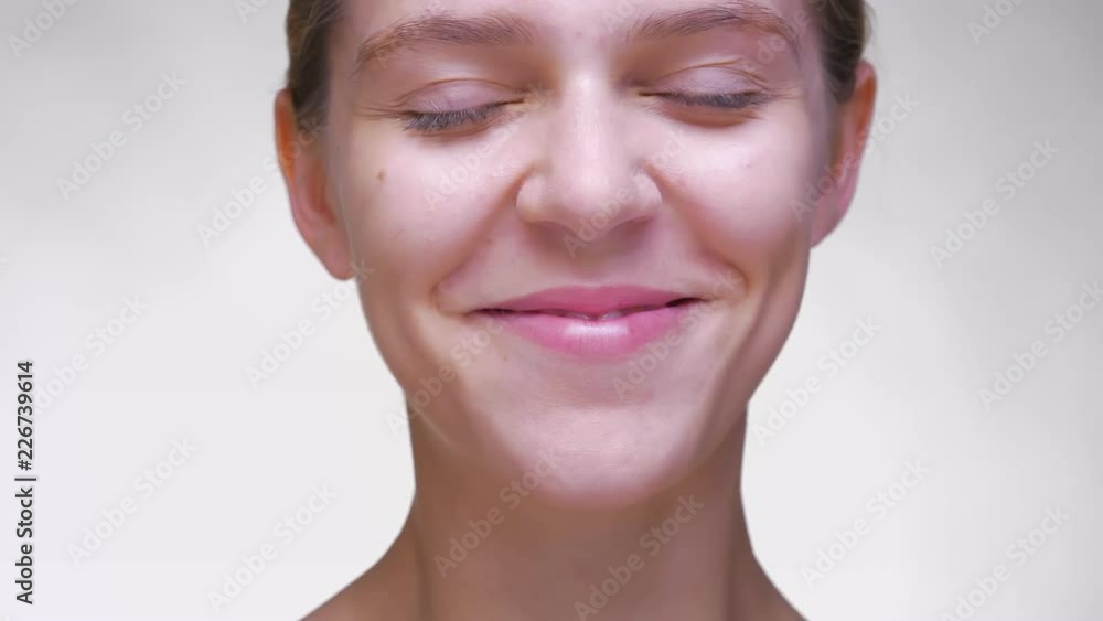 Amazing smile of happy caucasian woman with pure fresh face and perfect skin, looking at camera closely Amazing smile of happy caucasian woman with pure fresh face and perfect skin, looking at camera closely