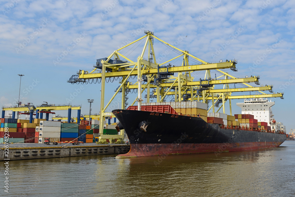 Fototapeta premium Container vessel moored in port