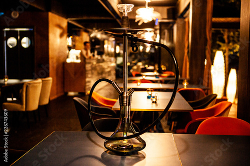hookah in lounge bar on the table. Relaxation habit photo