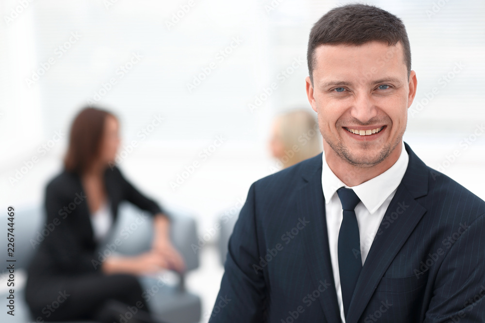 successful businessman on blurred background office successful businessman on blurred background office