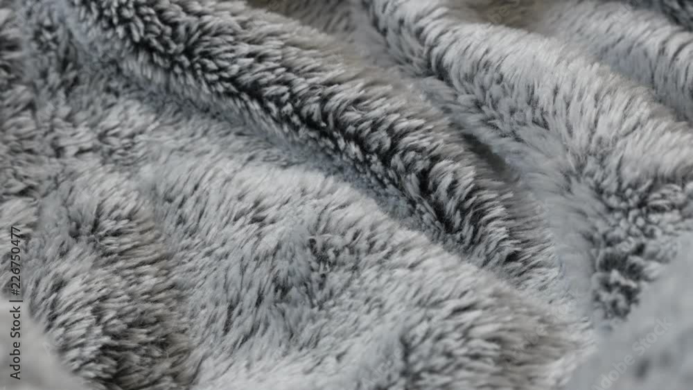 Dark gray hairy artificial fur fabrics 4K panning video Dark gray hairy artificial fur fabrics 4K panning video