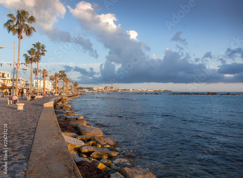 The promenade of Paphos on the island of Cyprus at sunset, a popular destination for traveling in Europe photo