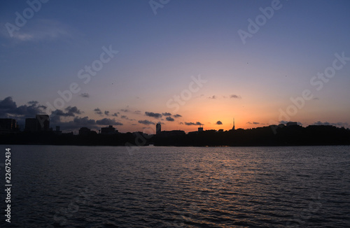 Cityline sunset over water, Ohori park, Fukuoka, Japan