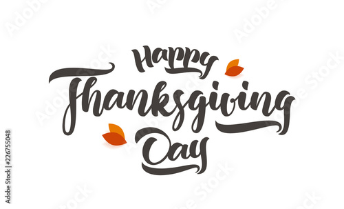 Vector handwritten calligraphic brush type lettering of Happy Thanksgiving Day with fall leaves on white background.