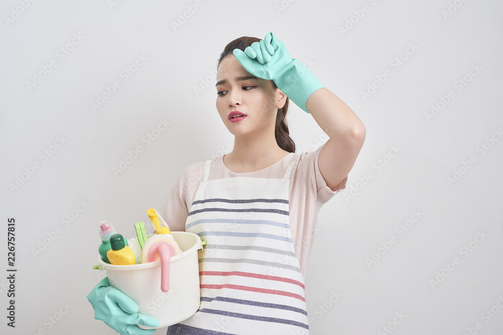 Young housewife is tired of cleaning,Exhausted housewife Young housewife is tired of cleaning,Exhausted housewife