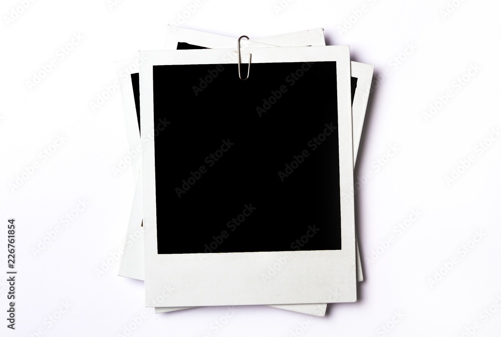 Three Blank Polaroid Frames with a Paper Clip Stock Photo | Adobe Stock