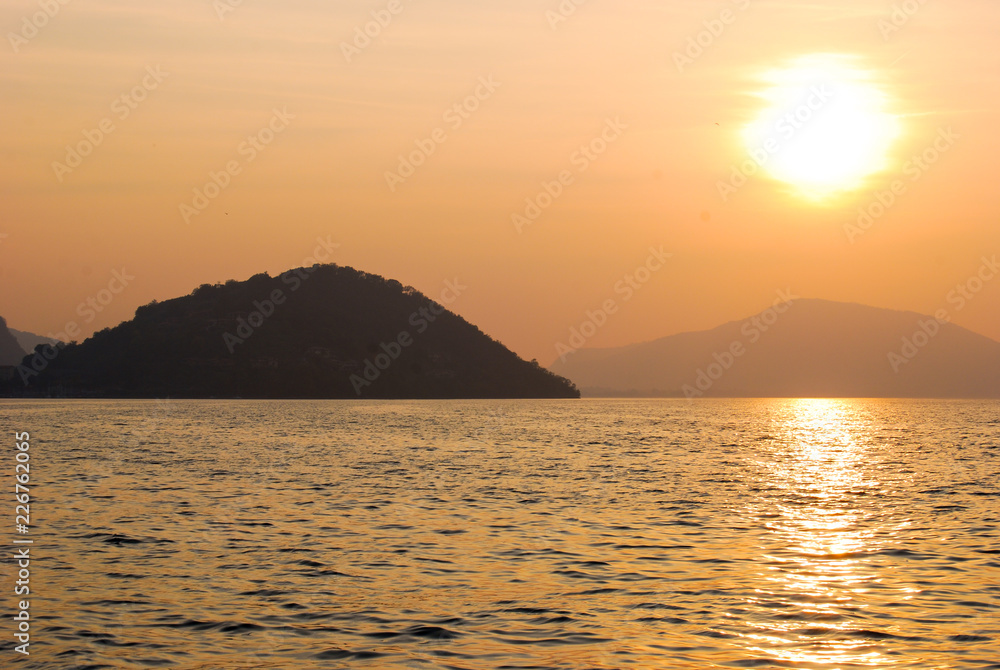Sunset view from the ferryboat in the Iseo lake