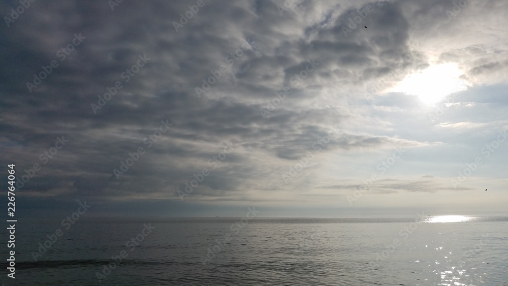 sky sunrise clouds water beach