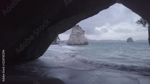 Forward movement out of cave at Cathedral Cove on Coromandel Peninsula in New Zealand