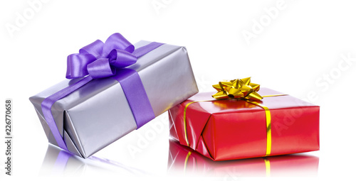 Colorful gift boxes with bows, isolated on white