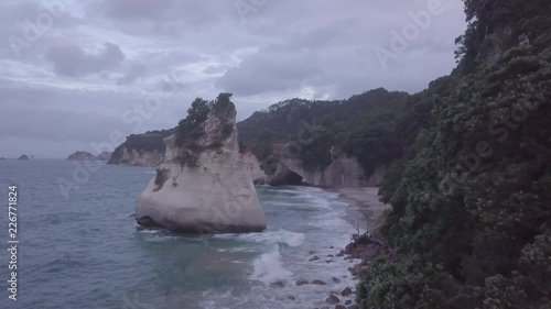 Flight towards Cathedral Cove cave on Coromandel Peninsula, New Zealand