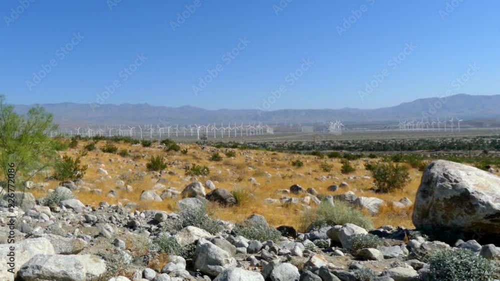 Wind turbines generating electricity at a desert wind farm near Palm Springs, California, USA Wind turbines generating electricity at a desert wind farm near Palm Springs, California, USA