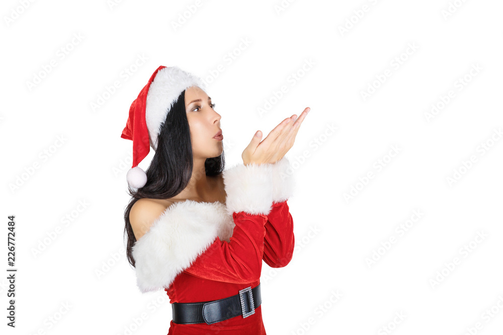 Beautiful girl Santa Claus with Asian looks with dark hair in Santa costume on white background. Insulations. Beautiful girl Santa Claus with Asian looks with dark hair in Santa costume on white background. Insulations.