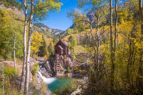 Crystal Mill in Colorado on a bright, sunny autumn day photo