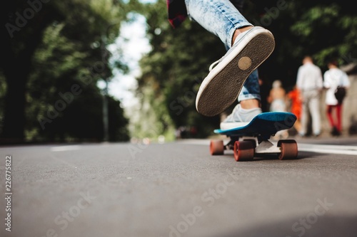 girl posing with skate board