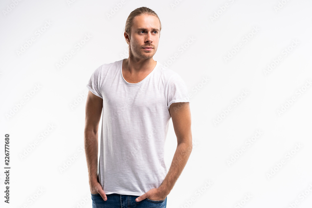 Handsome young guy posing in studio - isolated. Handsome young guy posing in studio - isolated.