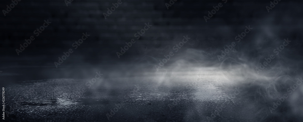 Background of an empty dark room. Empty walls, lights, smoke, glow, rays Background of an empty dark room. Empty walls, lights, smoke, glow, rays